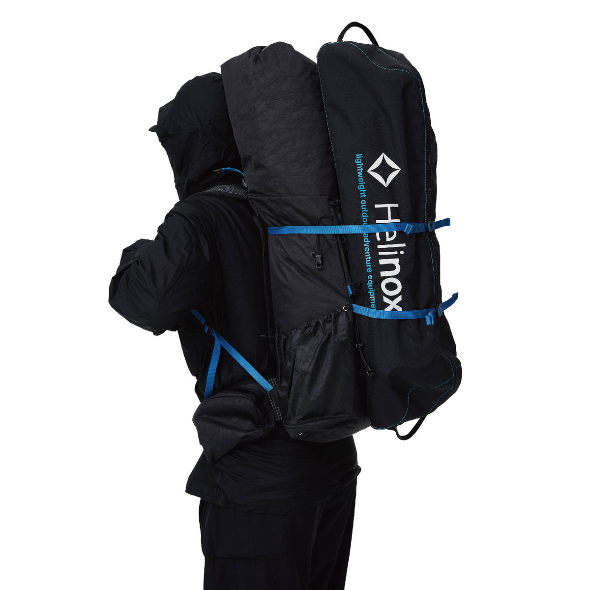 PPU Tibet 55 backpack carrying a folded Helinox item externally