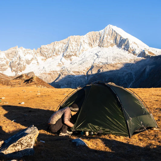 TFS Saga four-season tent for wild camping – camper beside tent