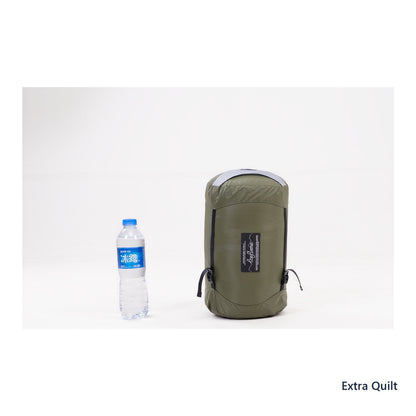 Iceflame Extra Quilt compression bag beside a water bottle