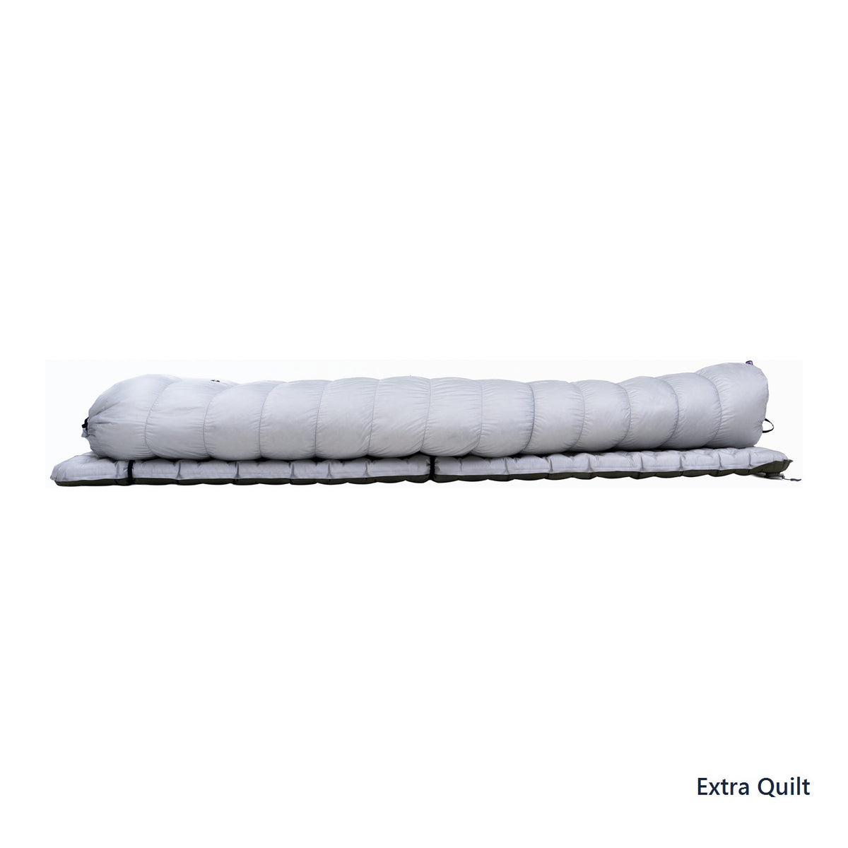 Iceflame Extra Quilt shown on a sleeping mat in side profile