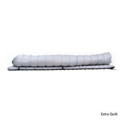 Iceflame Extra Quilt shown on a sleeping mat in side profile