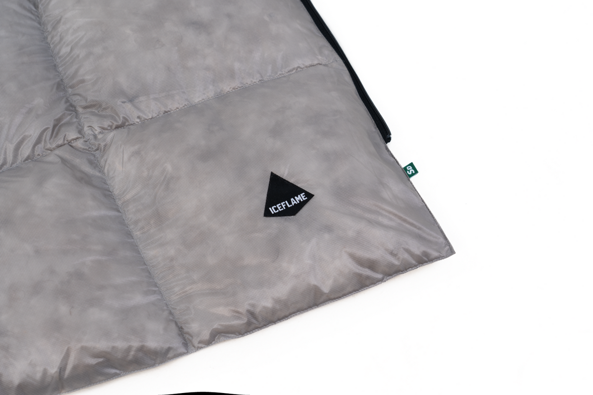 Iceflame NXT down blanket integrated storage pocket