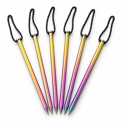 Six Mountain Spring titanium rainbow tent pegs on a white background